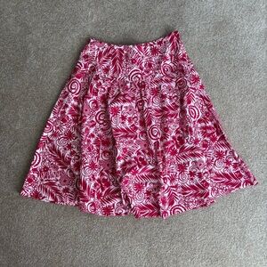 Isabella Bird red and white skirt.